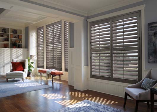 Heritance® Hardwood Shutters in Bedroom